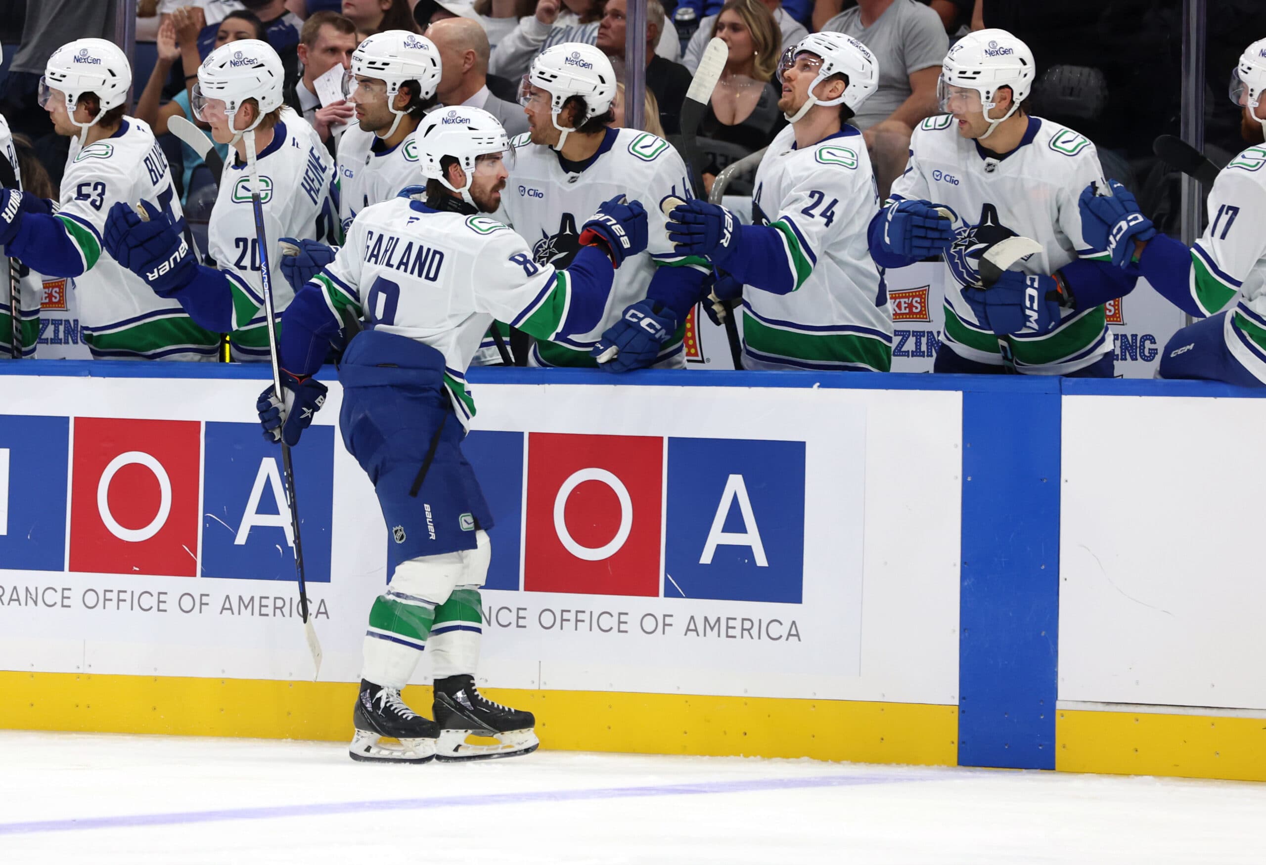 Conor Garland of the Vancouver Canucks celebrates scoring a goal against the Tampa Bay Lightning.